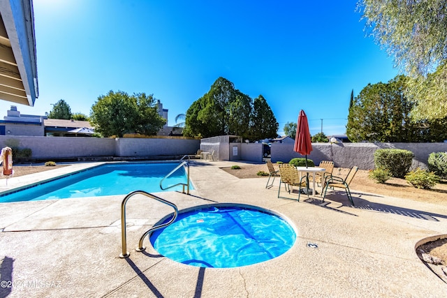 view of pool featuring a patio area