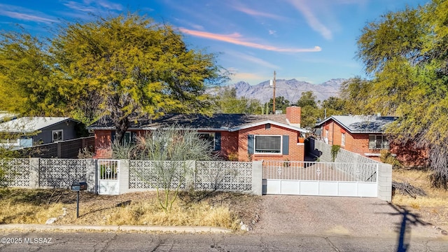 ranch-style house with a mountain view