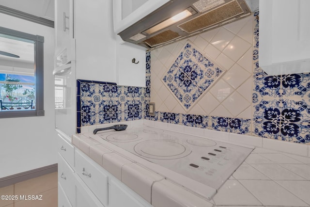 bathroom with tile patterned flooring and vanity