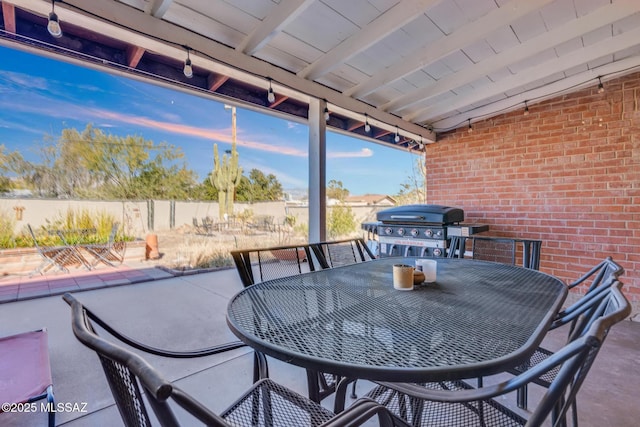 patio terrace at dusk with area for grilling