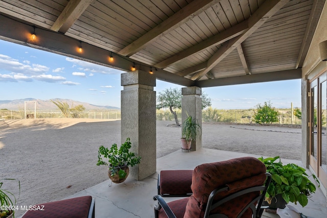 view of patio / terrace featuring a mountain view, a gazebo, and grilling area