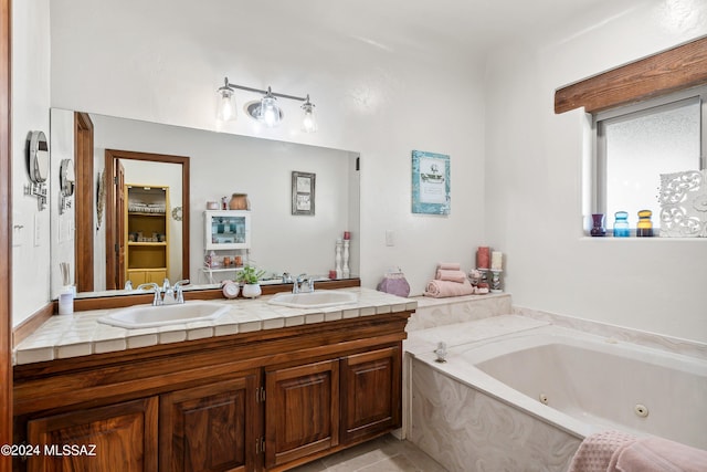 bathroom with a bathing tub and vanity