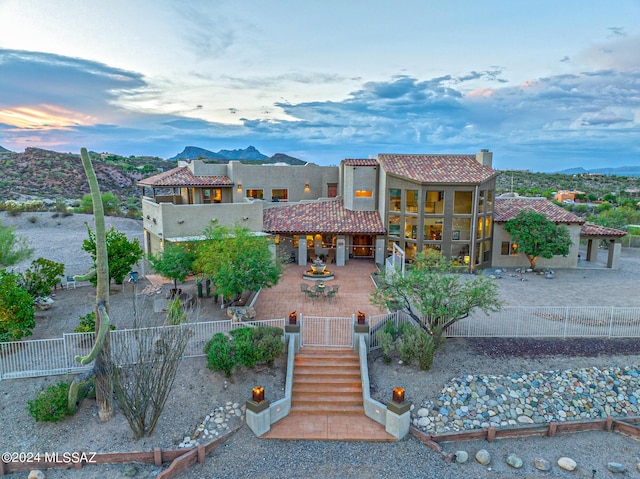 view of front of home with a patio area