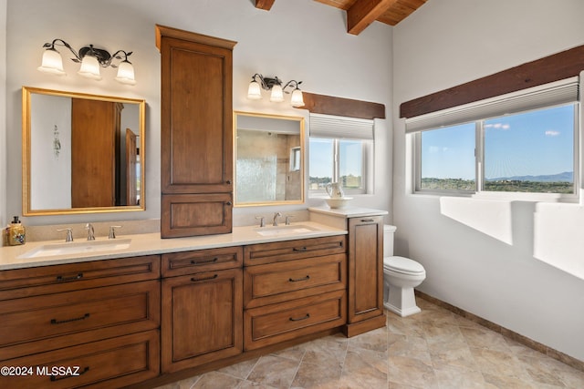 bathroom featuring beam ceiling, vanity, wood ceiling, and toilet