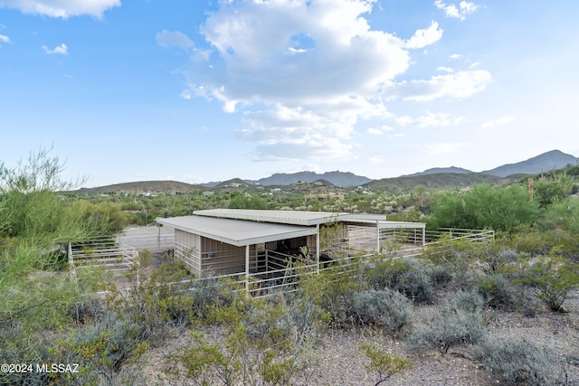 exterior space with a mountain view and a rural view