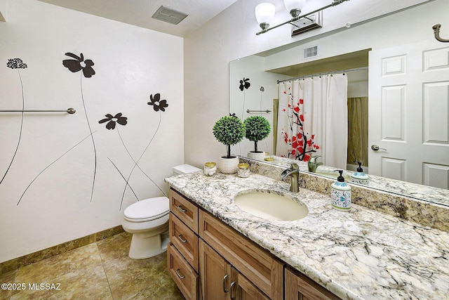 bathroom featuring walk in shower, tile patterned flooring, vanity, and toilet