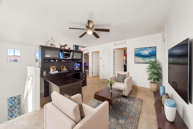 living room with ceiling fan