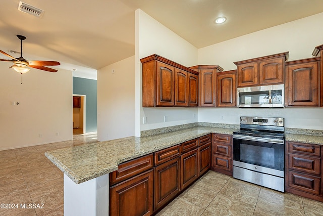 kitchen featuring ceiling fan, light stone counters, kitchen peninsula, and stainless steel appliances