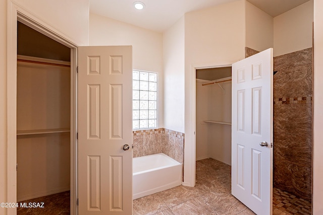 bathroom with independent shower and bath