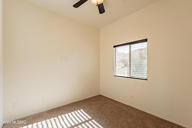 carpeted empty room with ceiling fan