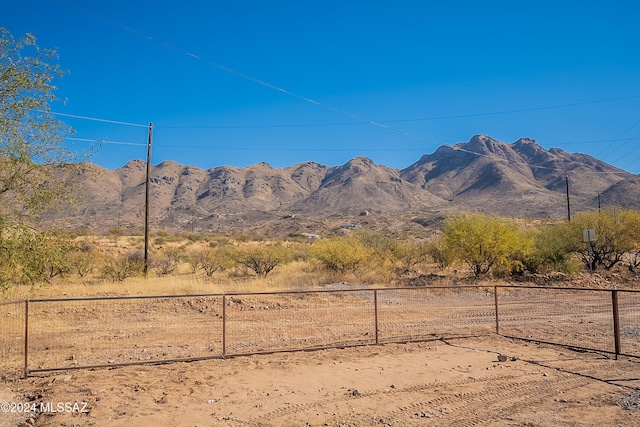 mountain view featuring a rural view