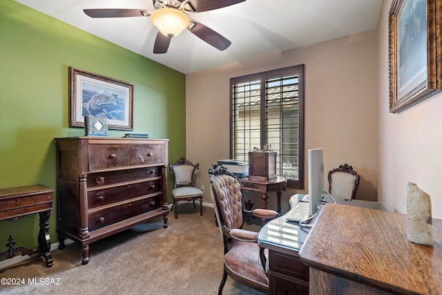 office with carpet flooring and ceiling fan