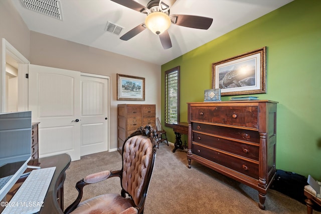 office featuring light colored carpet and ceiling fan