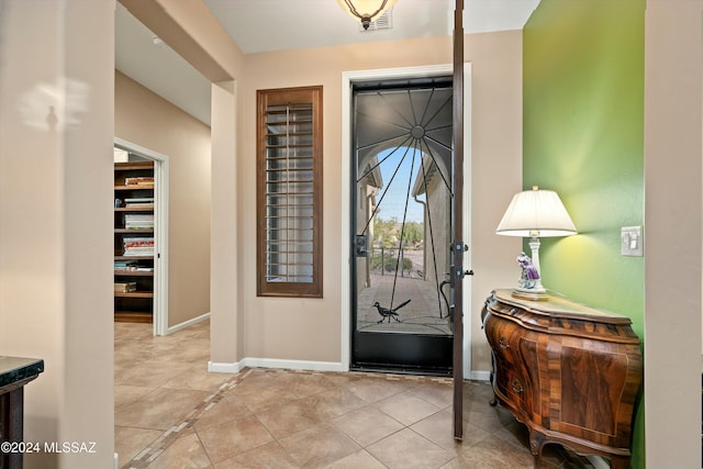 view of tiled foyer entrance