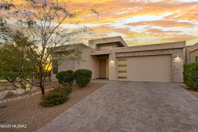 view of front of property featuring a garage