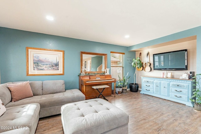 living room with light hardwood / wood-style floors