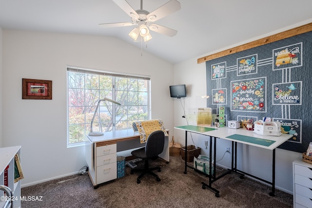 office area with dark colored carpet, ceiling fan, and lofted ceiling