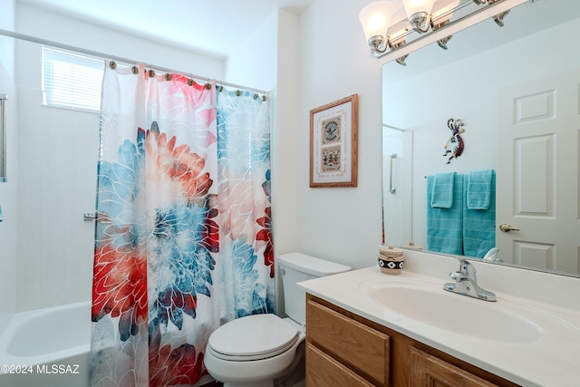 full bathroom featuring vanity, shower / bath combination with curtain, and toilet