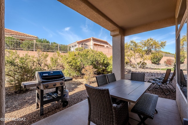 view of patio with a grill