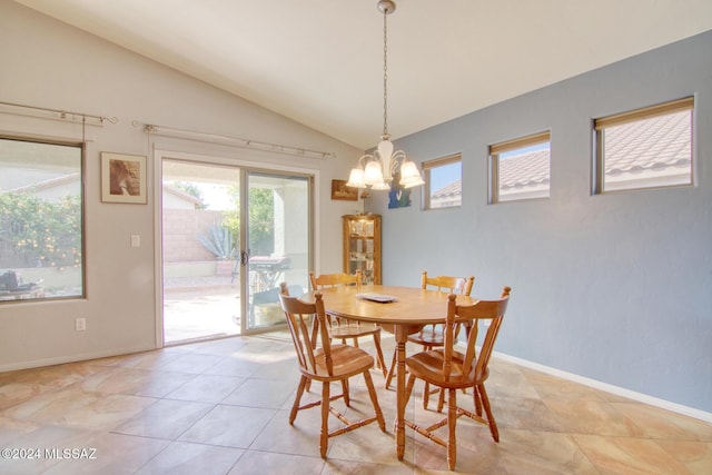 tiled dining space with a notable chandelier and vaulted ceiling