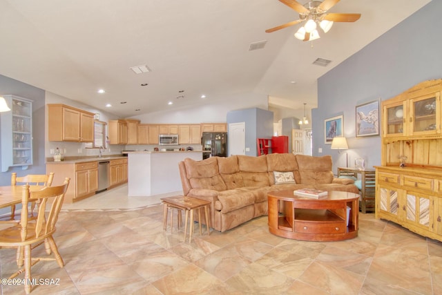 living room with ceiling fan, sink, and lofted ceiling