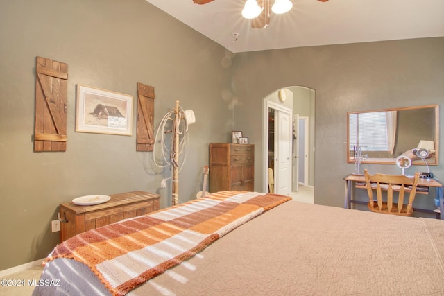 bedroom featuring ceiling fan and lofted ceiling