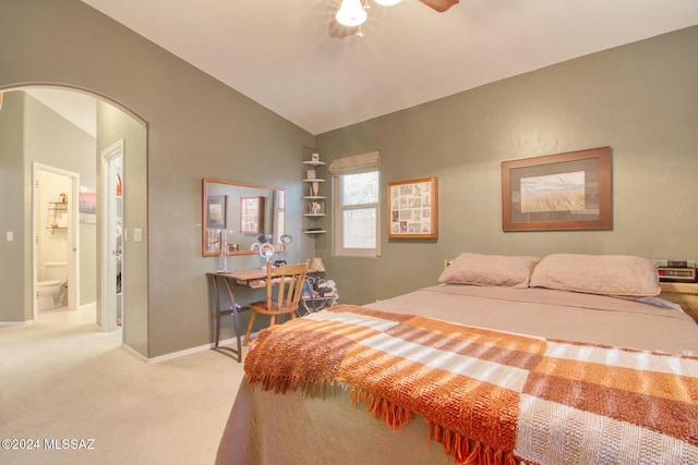 carpeted bedroom with ceiling fan and lofted ceiling