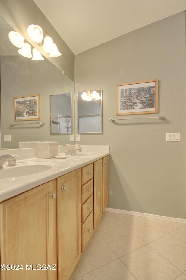 bathroom featuring tile patterned floors and vanity