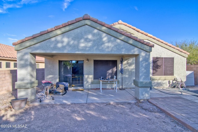 back of house featuring a patio