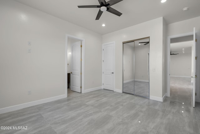 unfurnished bedroom with a closet and ceiling fan