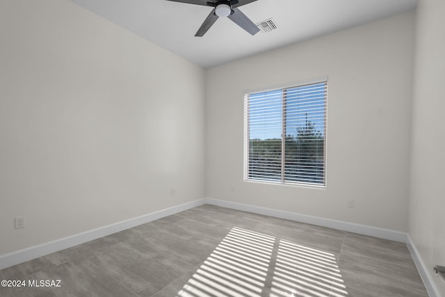 spare room featuring ceiling fan