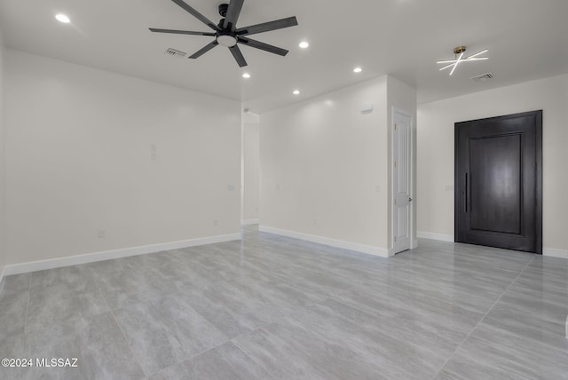 unfurnished room featuring ceiling fan