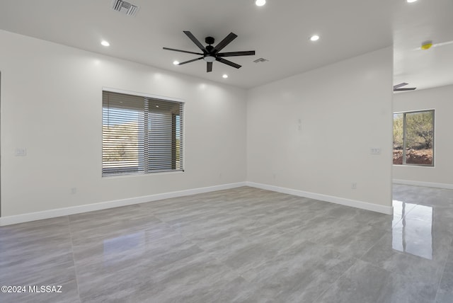 unfurnished room featuring ceiling fan