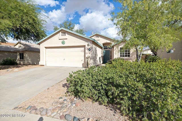 single story home with a garage