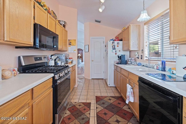 kitchen featuring vaulted ceiling, sink, black appliances, pendant lighting, and light tile patterned floors