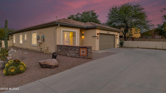 view of front of house with a garage