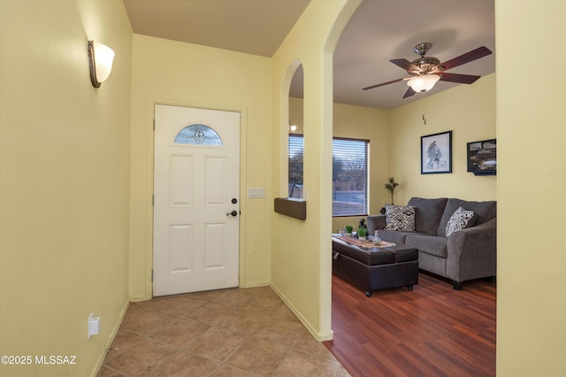 entrance foyer with hardwood / wood-style flooring and ceiling fan