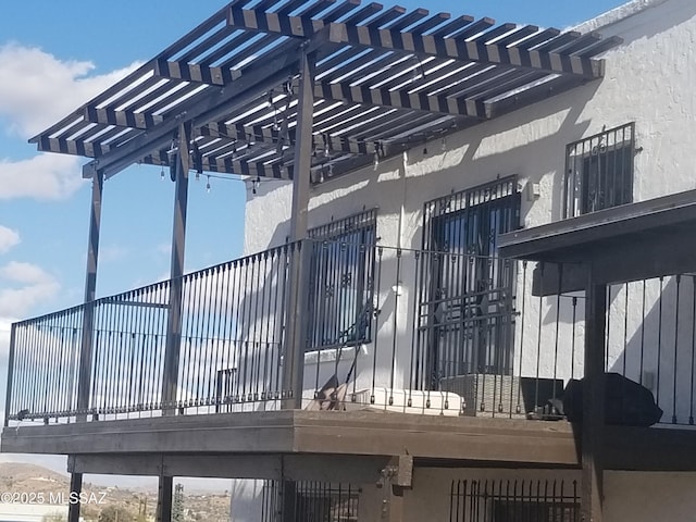 view of gate with a pergola