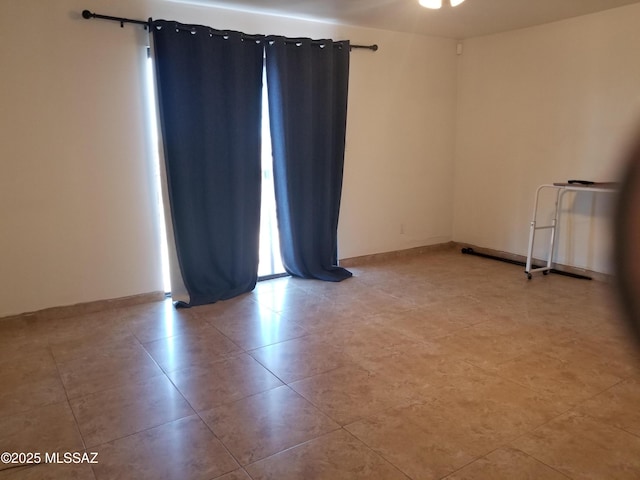 722 N Holm Cir, Nogales, AZ 85621 - spare room with baseboards
