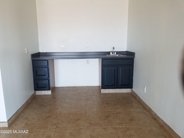 722 N Holm Cir, Nogales, AZ 85621 - bar with baseboards, a sink, and tile patterned floors