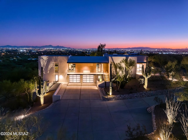 view of front of home with a mountain view