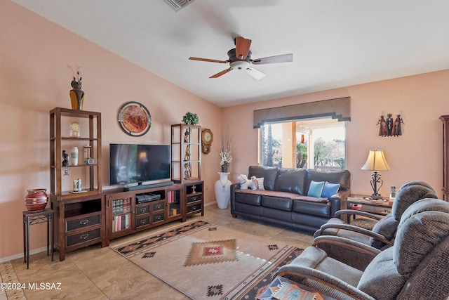 tiled living room featuring ceiling fan