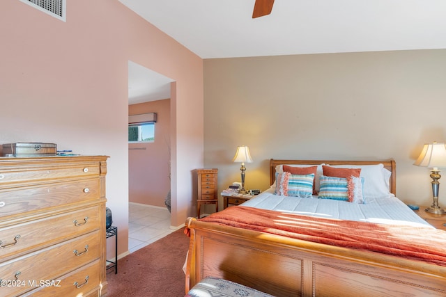 bedroom featuring ceiling fan and light tile patterned flooring