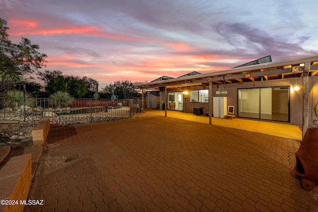 yard at dusk with a patio