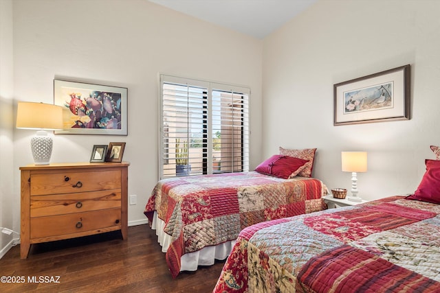 bedroom featuring dark hardwood / wood-style floors