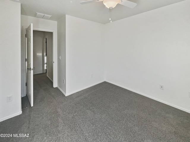 empty room featuring ceiling fan