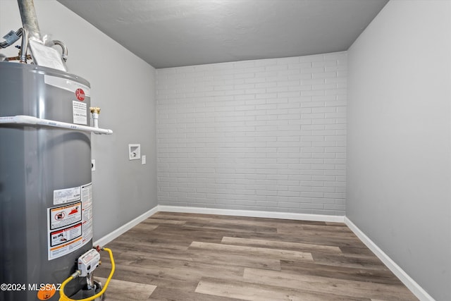 utility room with water heater