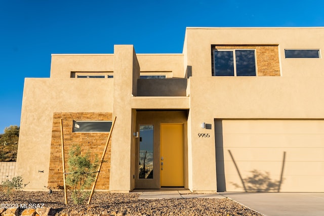 view of front of property featuring a garage