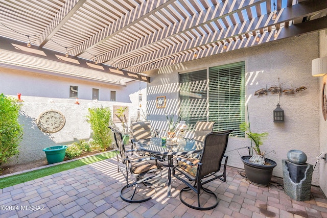 view of patio featuring a pergola