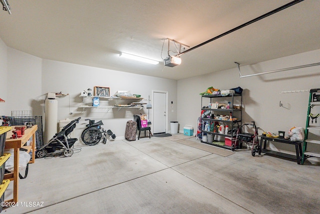 garage featuring a garage door opener